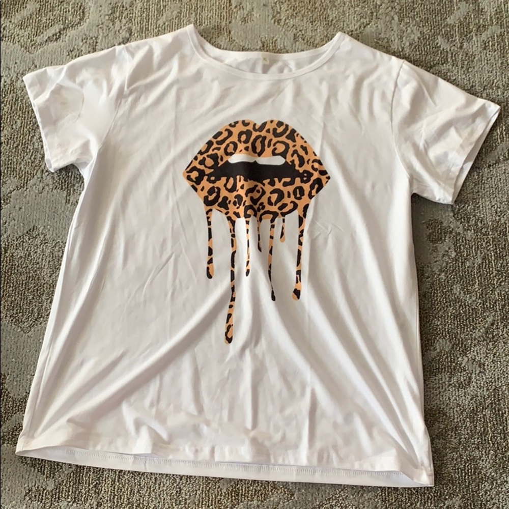 White short sleeve w/ cheetah decal!